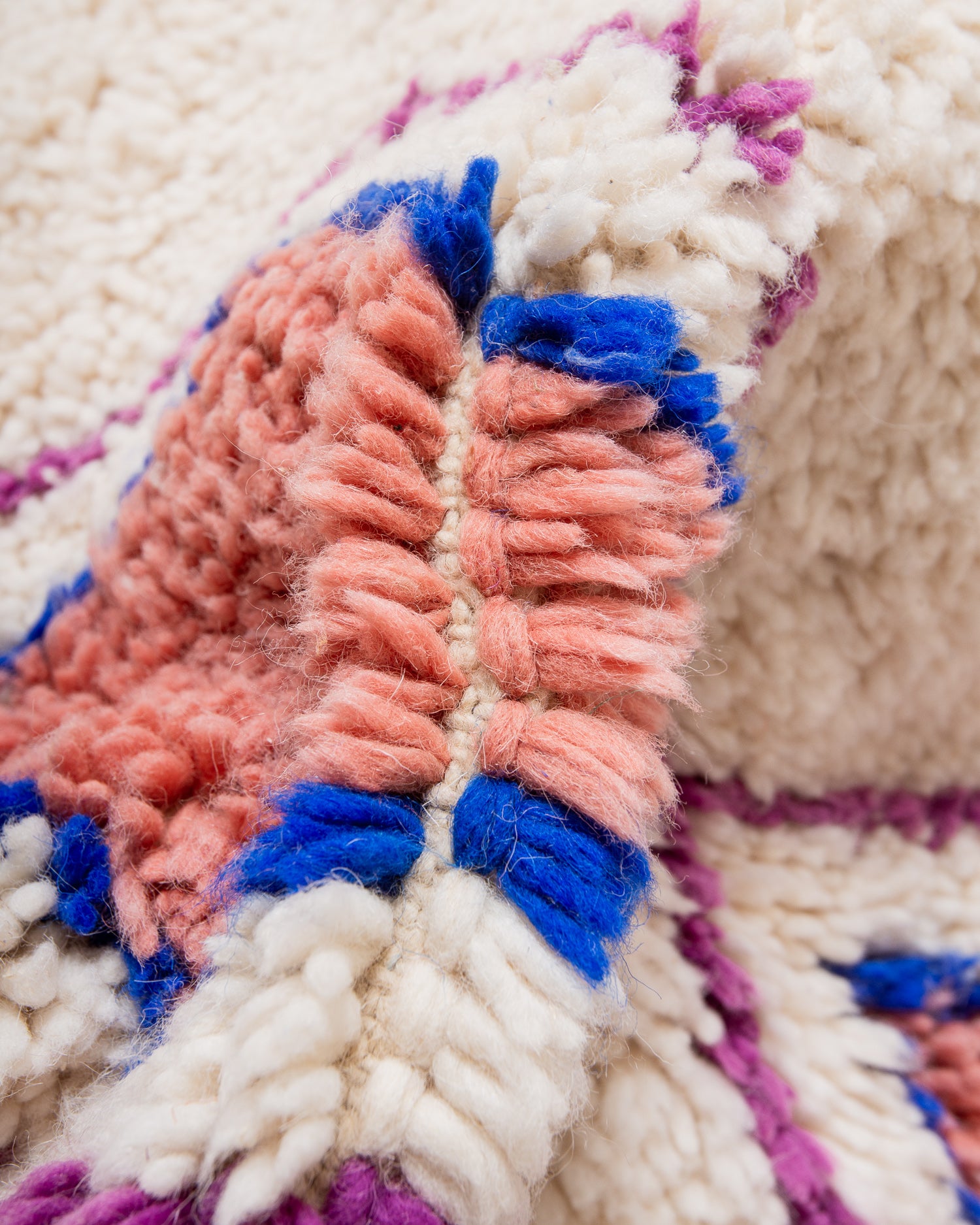 Modern, designer, handcrafted Berber rug from Morocco. Beniourain carpet with beautiful colours and patterns and fluffy wool texture.